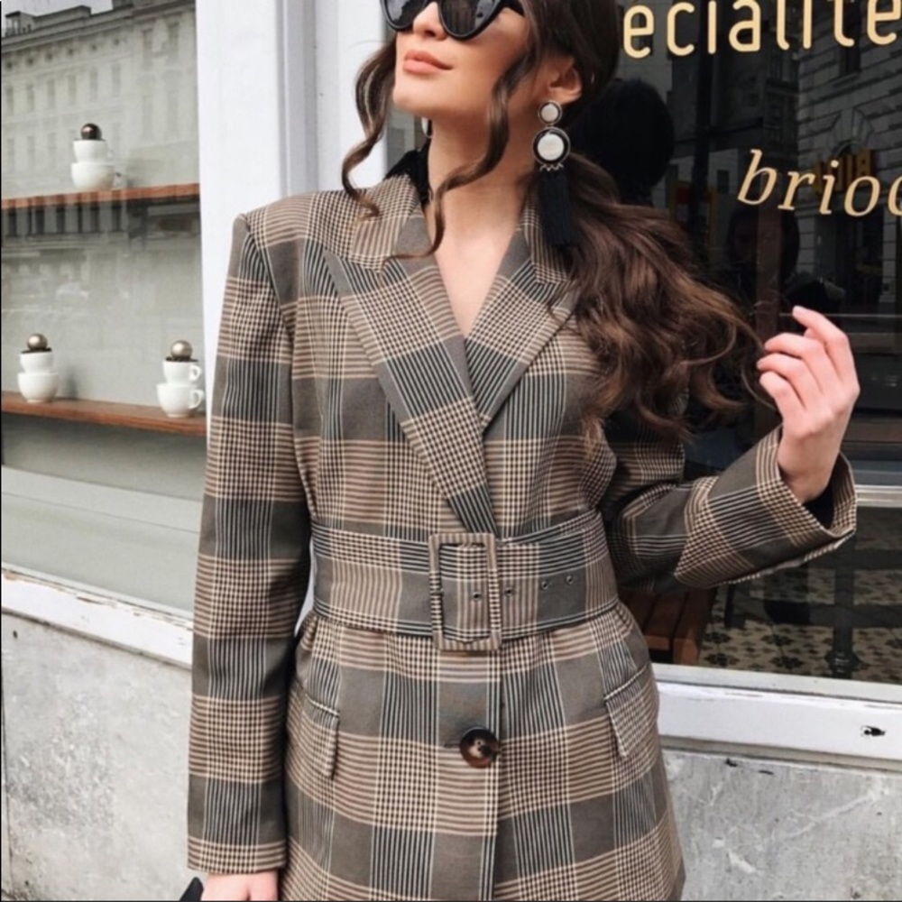 Zara’s checked blazer with a belt.